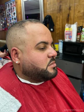 Dominican barber shop, Milwaukee - Photo 2