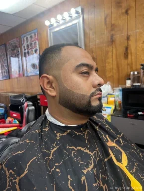 Dominican barber shop, Milwaukee - Photo 1